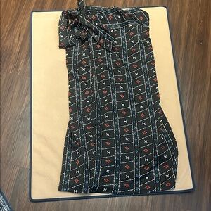 Black Patterned satin wrap skirt with Red and Blue Accents